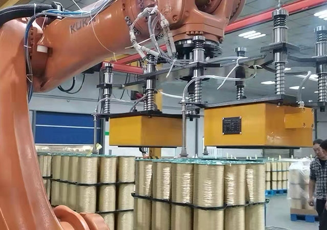使用機械手電永磁鐵搬運工字輪，產能翻四倍